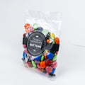 Bag of colourful miniature chocolate buttons